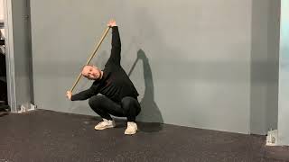 Squat with overhead side bends demonstration